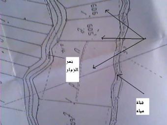 land in beka`a with water around Beka3