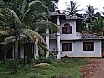 Land with a half build hous Gampaha Danowita