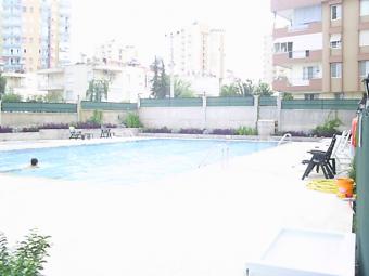 in city with swimming pool... Antalya